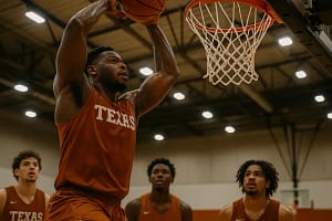 Marcus Spears Jr works near the basket during a Texas basketball practice setting